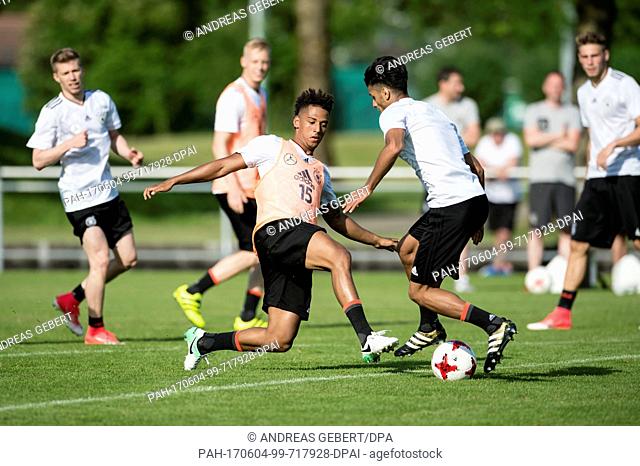 Thilo Kehrer (l) and Mahmoud Dahoud in action during a training session at the European Championship training camp of the German U21 soccer national team in...