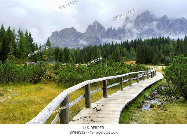 wooden path through panoramic view at the Kreuzbergpass on the Sexten Dolomites, Italy, South Tyrol, Dolomites