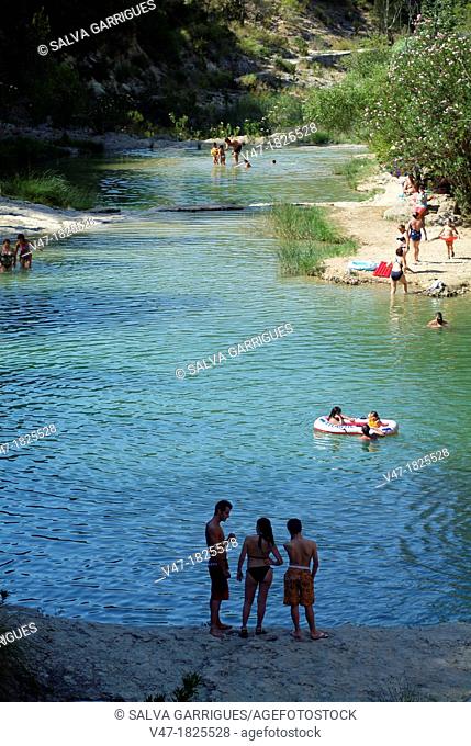 People happening the day in the beach fuvial from Quesa, Canal de Navarres, Spain, Europe