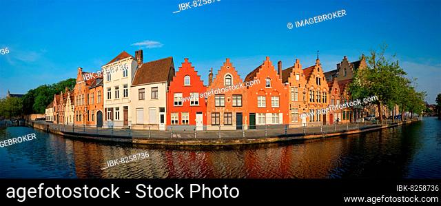 Typical Belgian cityscape Europe tourism concept, panorama of canal and old houses on sunset. Bruges (Brugge), Belgium, Europe