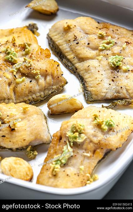 salmon trout baked with garlic