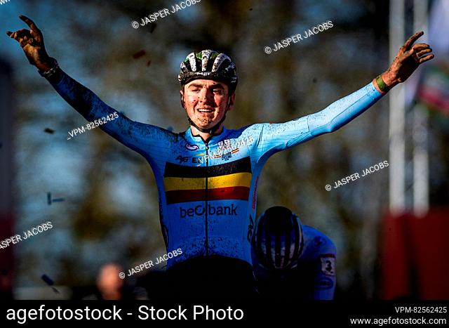 Belgian Emiel Verstrynge celebrates as he crosses the finish line to win the U23 race at the World Cup cyclocross cycling event in Namur, Belgium