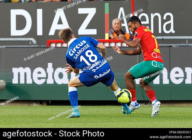 Gent's Matisse Samoise and Oostende's David Atanga fight for the ball during a soccer match between KV Oostende and KAA Gent, Friday 12 August 2022 in Oostende