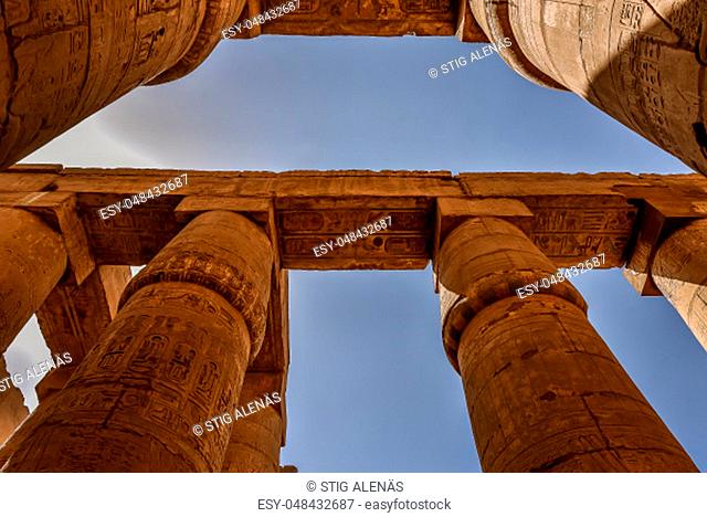 Columns and blue sky in the great hypostyle hall at the temple of Amon-Re in Karnak, Egypt, October 22, 2018
