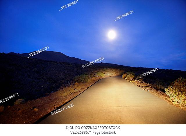Spain, Canary Islands, El Hierro. Night view of the road from La Restinga