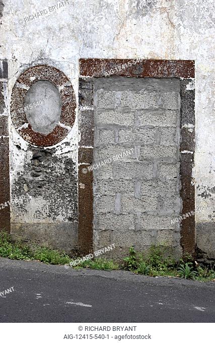 Madeira. blocked doorway and window in disused building