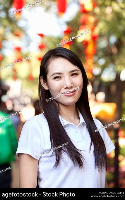 Smiling Young Woman In Nanluoguxiang, Beijing
