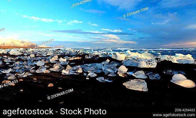 Iceburgs washed up on the beach from the meltin jokulsarlon glacier lagoon south iceland
