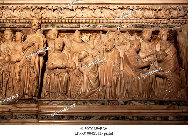 Close up view of ornate carved marble sarcophagus, in chapel of San Domenico, Bologna Italy