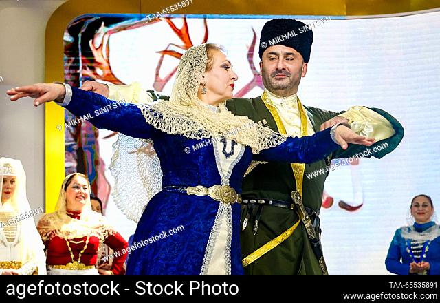 RUSSIA, MOSCOW - DECEMBER 7, 2023: Members of a dancing group perform during a traditional Ossetian wedding held as part of North Ossetia – Alania Republic Day...