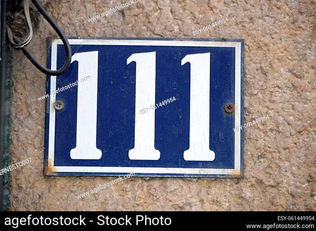 number 111 on a house in Lisbon - Lisboa - the capital of Portugal, September, 2018