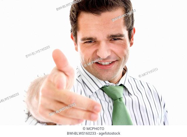 young businessman pointing at something