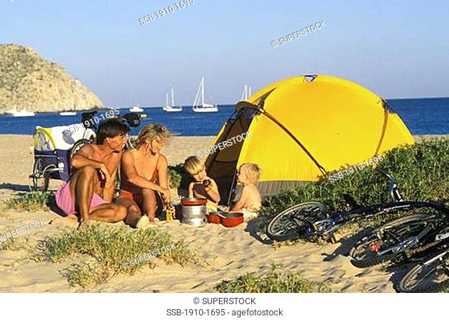 Family beach camping with bicycles Bahia Los Frailes East Cape near San Jose del Cabo MEXICO Baja California