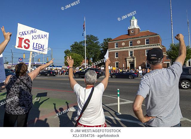 Detroit, Michigan USA - 12 July 2019 - People upset about the separation of immigrant families and the detention of refugees and small children lined both sides...