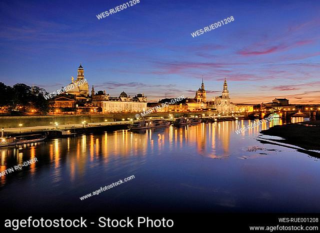 Germany, Saxony, Dresden, view to Elbe river and Dresden skyline at sunset