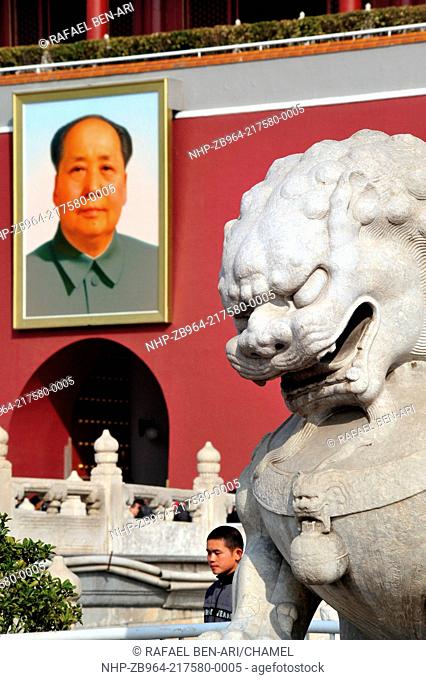 BEIJING - MARCH 11:Chinese msn walk under a portrait of Mao Zedong in Tiananmen square on March 11 2009 in Beijing, China Chairman Mao Zedong is still being...