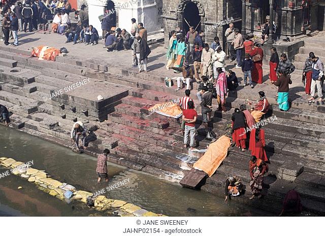 Nepal, Kathmandu, Pashupatinath Temple, Cremation ceremony, Bagmati river at Shivaratri festival