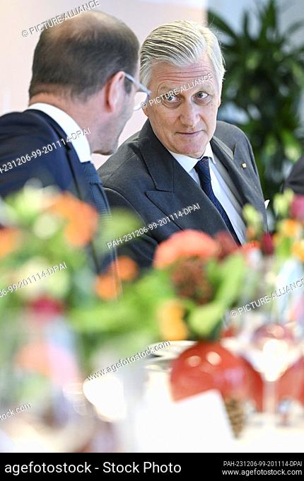 06 December 2023, Berlin: Stefan Kapferer, CEO of 50Hertz, and King Philippe during a visit to 50Hertz Transmission GmbH as part of the Belgian royal couple's...