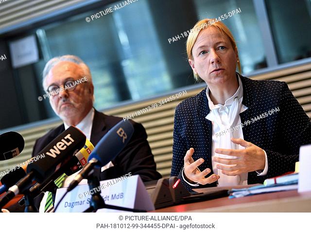 12 October 2018, Berlin: Bundestag members Rudolf Henke (CDU/CSU) and Dagmar Schmidt (SPD), giving a press conference on the subject of blood tests for Down's...