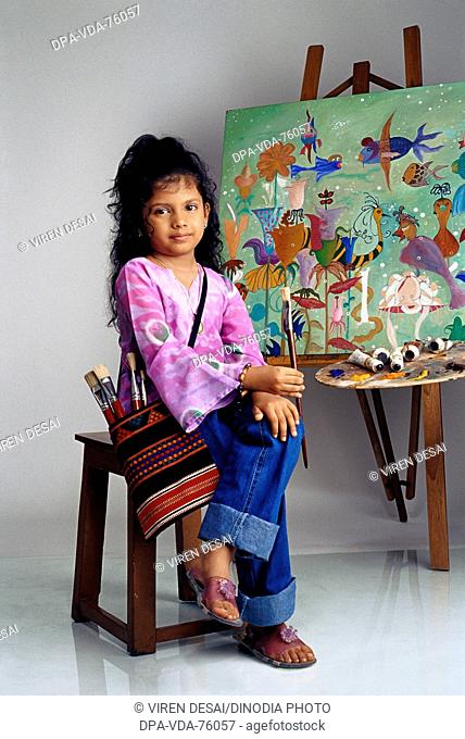 Artist , Young girl with painting and brushes, color and pallette