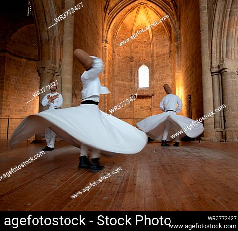 Nicosia, Cyprus, June 5 2019: Group of Dervishes performing the traditional and religious whirling dance or Sufi whirling