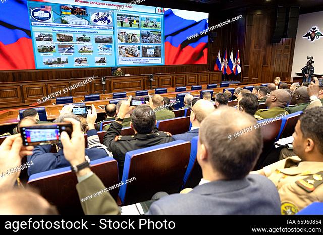 RUSSIA, MOSCOW - DECEMBER 21, 2023: Valery Gerasimov (back), Chief of the General Staff of the Russian Armed Forces, gives a briefing for foreign military...