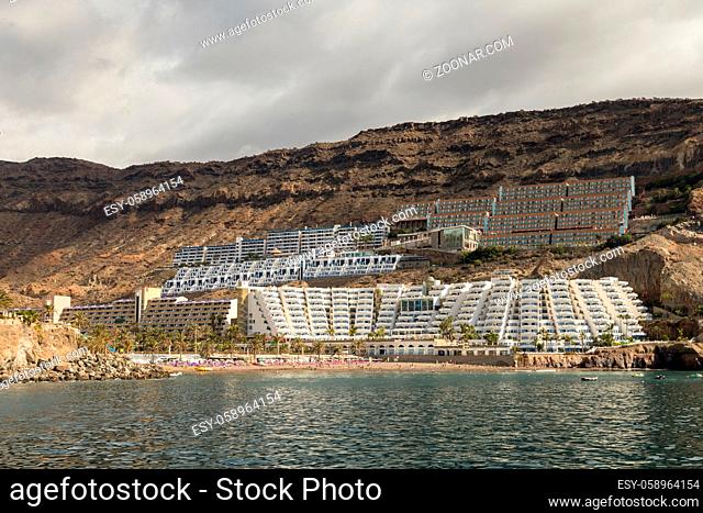 Taurito, Gran Canaria. Beach and hotels seen from the sea. Taurito is a very popular tourist destination