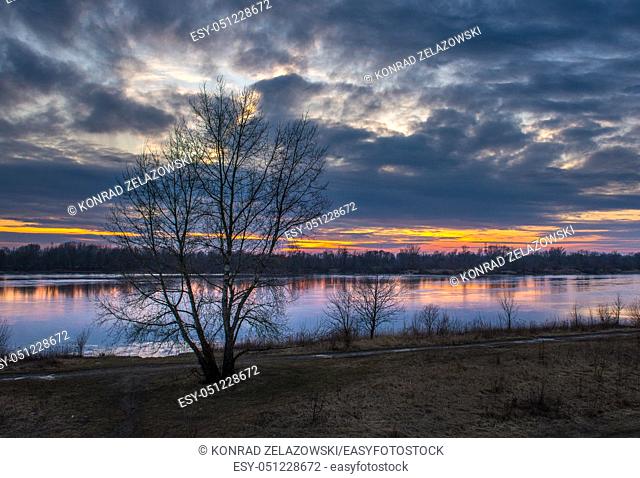 Sunset over Vistula River seen from a bank in Tarchomin District of Warsaw, Poland
