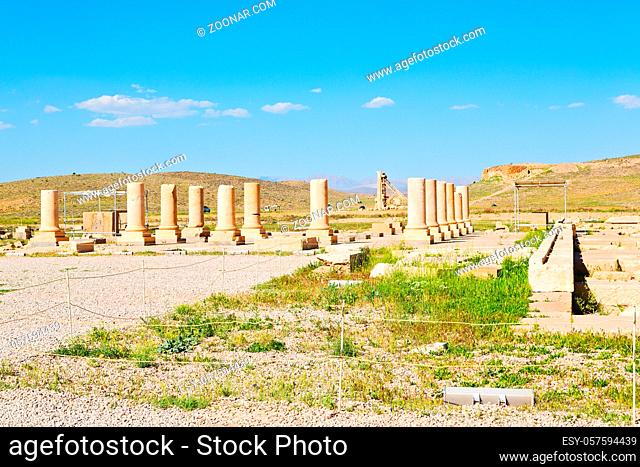 in iran  pasargad the old construction temple and grave column blur