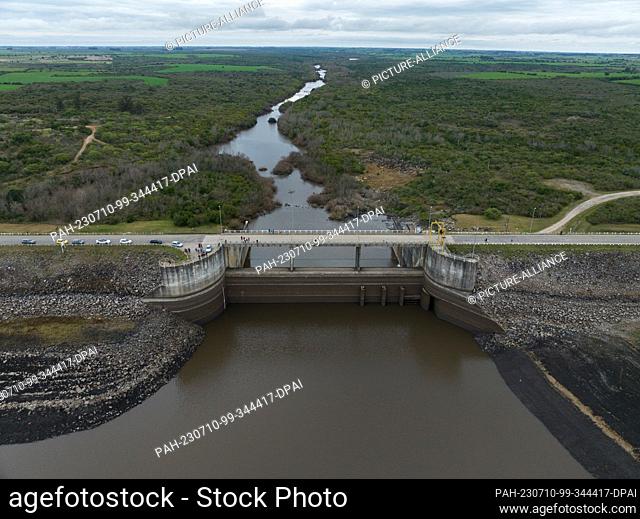 09 July 2023, Uruguay, Paso Severino: The Santa Lucía River at the Paso Severino Dam carries little water. The reservoir at the Paso Severino dam supplies...