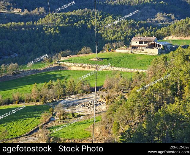 Pasture land, forests and typical catalan farmhouse or ""Masia"". LluçÃ  village countryside. Lluçanès region, Barcelona province, Catalonia, Spain