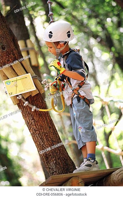 Child climbing trees