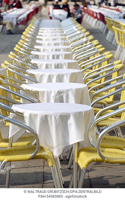 Despite the rising water (Acqua alta), tables and chairs stand on Piazza San Marco in Venice, Italy, 09 September 2014. Photo: Waltraud Grubitzsch/dpa - NO...
