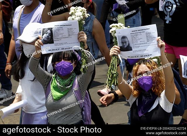 MEXICO CITY, MEXICO - APR 24, 2022: Women take part during a protest to demand justice for Debanhi Escobar and the thousands of women victims of gender-based...