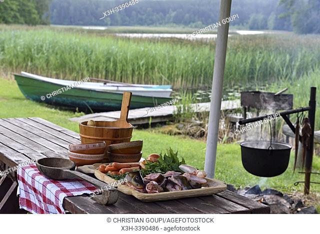 preparation of smoked fish soup, Gaideliai rural tourism homestead on the edge of Srovinatis lake, Ginuciai, Aukstaitija National Park, Lithuania, Europe