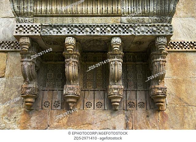Stone carvings on outer wall of Jami Masjid (Mosque), UNESCO protected Champaner - Pavagadh Archaeological Park, Gujarat, India