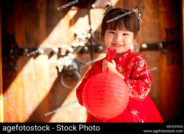Cute girl with red lanterns