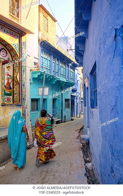 Women on colorful saris at the backstreets of Bundi