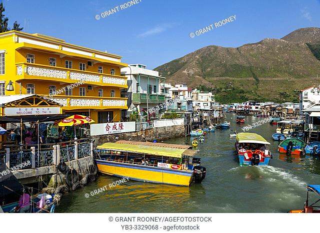 Tourists Taking A Boat Trip Down The Tai O River, Tai O Fishing Village, Hong Kong, China