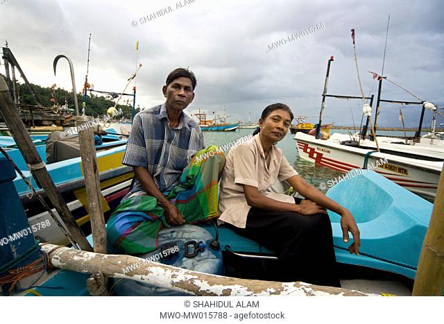 Fisherman Sudurikku Ganadsa, 57, with his wife Francisco Baduge Roslin, 50, received a loan from Help the Aged to buy fishing nets He has another loan which he...