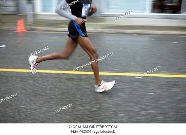 Blurred view of Male Runners Legs, 2007 BMO Marathon, Vancouver, British Columbia