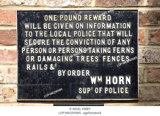 England, North Yorkshire, Ripon, Railway sign offering a reward of one pound for information to secure a conviction for persons or person taking ferns or...