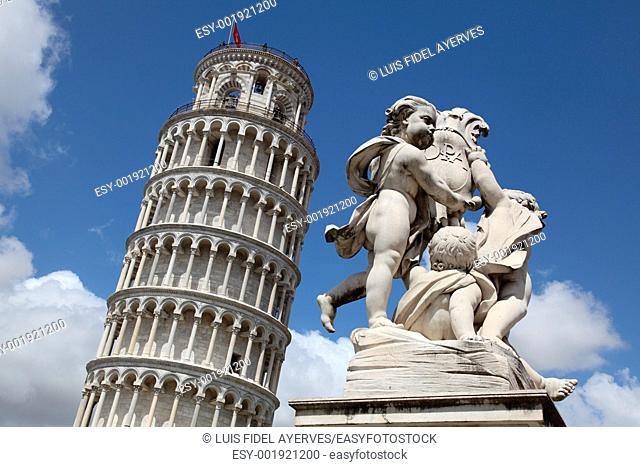 The putti fountain and the Leaning Tower of Pisa, Tuscany, Italy
