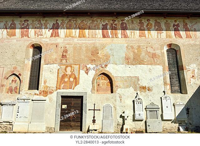 Exterior of the Church of San Vigilio in Pinzolo and its fresco paintings "Dance of Death" painted by Simone Baschenis of Averaria in1539, Pinzolo, Trentino