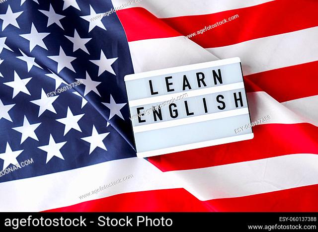 American flag. Lightbox with text LEARN ENGLISH Flag of the united states of America. July 4th Independence Day. USA patriotism national holiday
