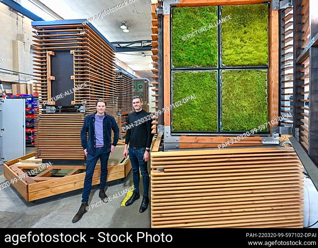 PRODUCTION - 14 February 2022, Brandenburg, Bestensee: Simon Dierks (l), Head of Marketing, and Peter Sänger, founder and Managing Director of the company Green...