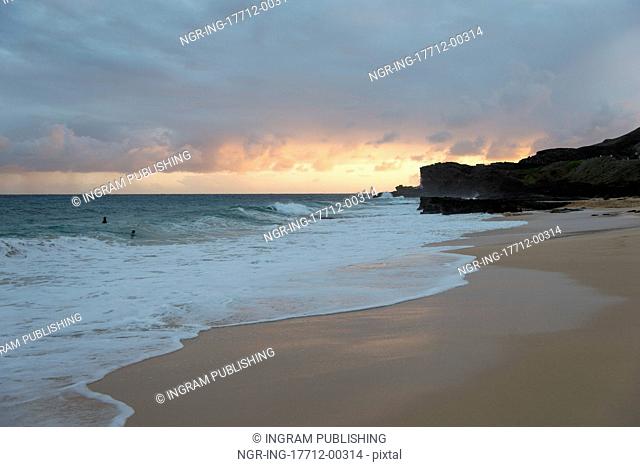 Surf on the beach at sunset, Sandy Beach, Hawaii Kai, Honolulu, Oahu, Hawaii, USA
