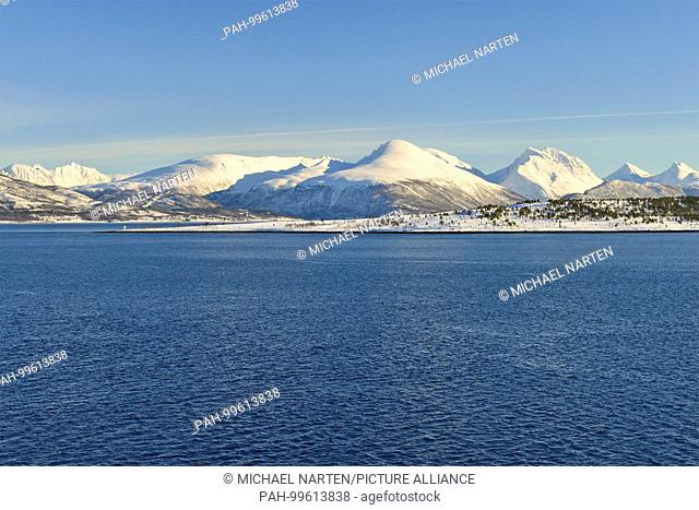 The Straumsfjord with the beginning of the Balsfford and the white peaks from the Norwegian mainland on the horizon, 6 March 2017 | usage worldwide