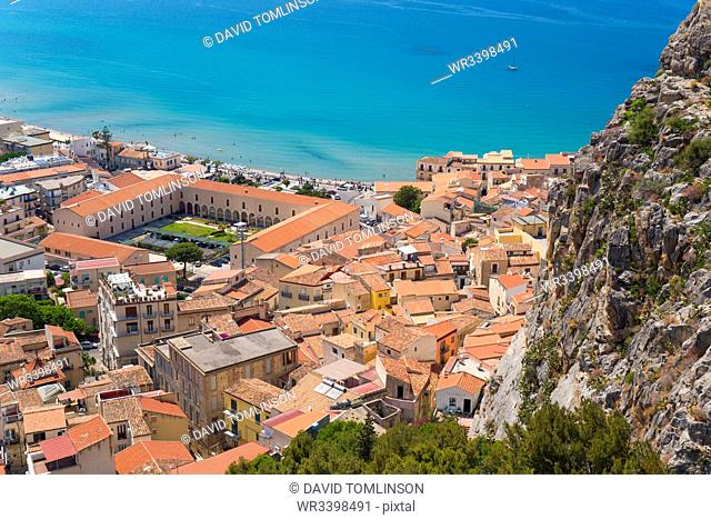 View from La Rocca over tiled rooftops to the calm turquoise waters of the Tyrrhenian Sea, Cefalu, Palermo, Sicily, Italy, Mediterranean, Europe