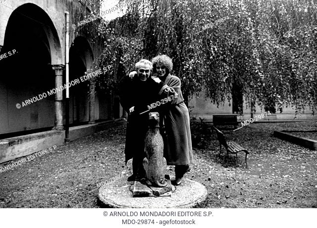 Portrait of Giorgio Albertazzi and Ornella Vanoni in a garden. Portrait of the Italian actor Giorgio Albertazzi and the Italian actress and singer Ornella...